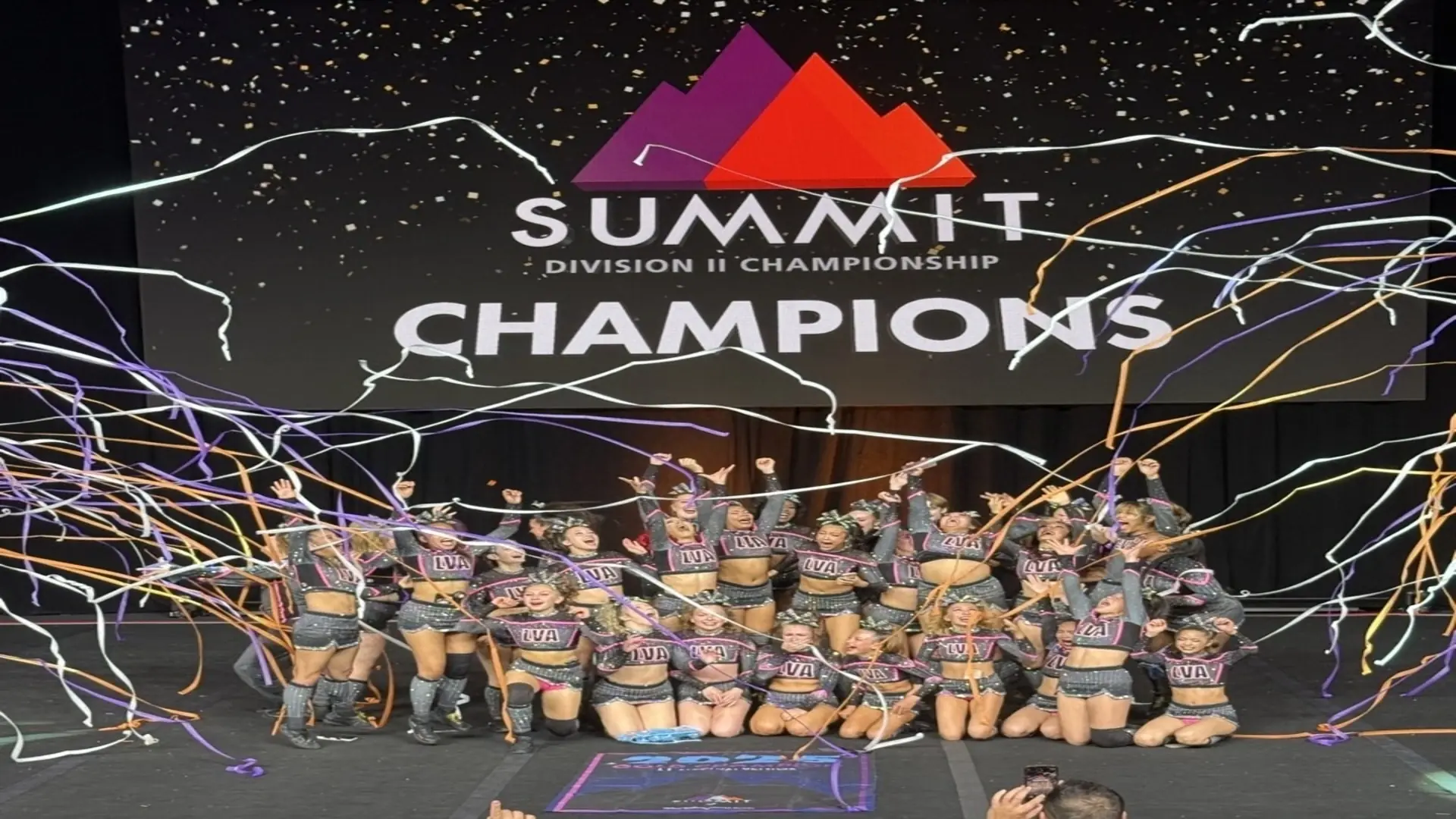 Las Vegas All Stars team celebrating Summit Division II Championship with confetti